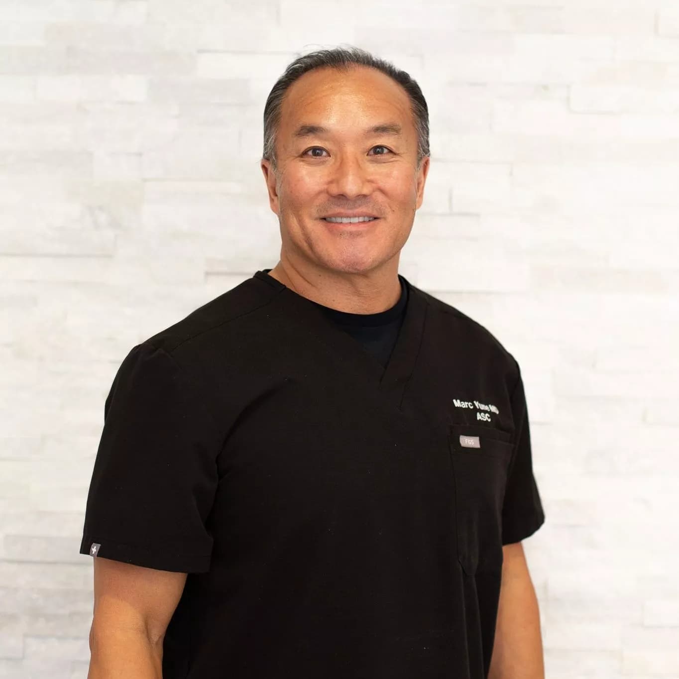 Marc E. Yune