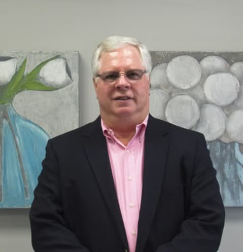 John E. Hurteau